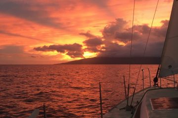 Maui sunset with sailboat in foreground
